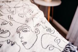 Minimalist Faces Throw Blanket, Black & White Line Art, Woven Cotton - thumbnail 1