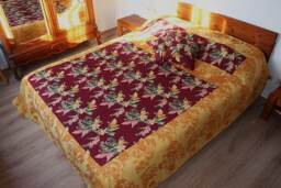 Covers Bed in Red & Yellow Assembled Fabrics , Decorated With Daffodils, Quilted, For 160 By 200
