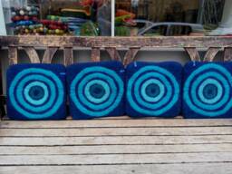 Handfelted Seat Cushion With Coloured Pattern Mix On Dark Blue