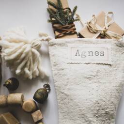 White Mudcloth Christmas Stocking With Pom Poms, Cream Minimalist Decor - thumbnail 3