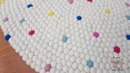 Handmade Wool Felt Ball Rug White With Colorful Accents - thumbnail 1