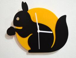 Cute Squirrel Holding An Acorn - Black & Yellow Silhouette Wall Clock