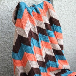 Hand-Knitted Chevron Baby Blanket Teal, Beige, Brown, & Orange - thumbnail 2