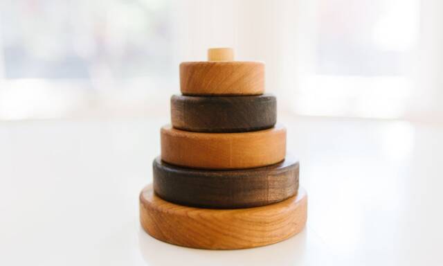 Wooden Circle Stacking Toy Cherry & Walnut Rings - image 1