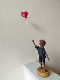 Boy With Red Heart Shaped Balloon. Mixed Media Sculpture. Paverpol Made To Order - thumbnail 1