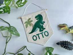 Personalised Dinosaur Felt Banner, Custom Name Wall Hanging, Toddler Room Sign - thumbnail 1