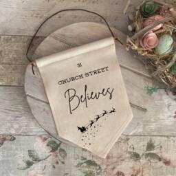 Personalised Christmas Flag, This House Believes Sign, Wall Hanging, Santa Stop Here We Believe Eve Box Gift - thumbnail 3