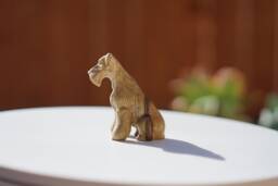 Schnauzer Figurine Or Sculpture. Made Of Solid Limba & Different Hardwoods. Gray in Color. Sitting Pose