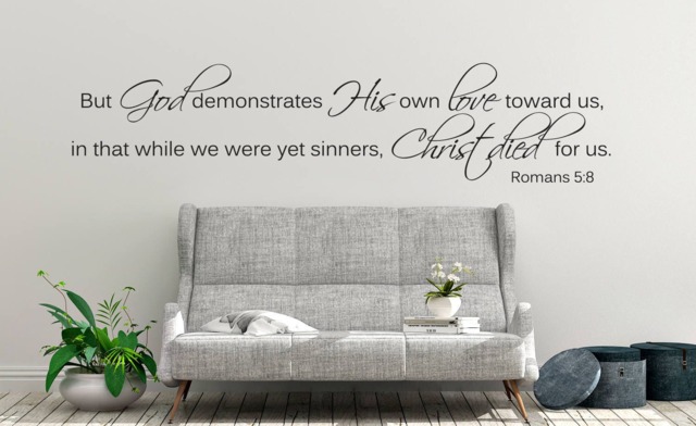 "Vinyl Wall Decal - Romans 58 ""But God Demonstrates His Own Love Toward Us, in That While We Were Yet Sinners, Christ Died For Us." - image 1