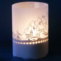 Interlaken Skyline Gift Tube Shadow Play - Stunning Souvenir Candle With Silhouette Projection For Fans Swiss Must-Have D??cor - thumbnail 1
