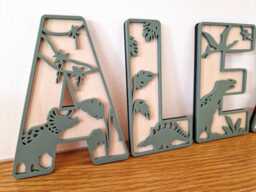 Wooden Dinosaur Letters Alphabet, Personalised Wall Name Sign, Dino Theme Nursery Decor, Childrens Bedroom, Girl Boy Kids Room Accessory - thumbnail 1