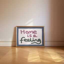 Home Is A Feeling Print, Cosy Wall Art, Entryway Hallway Hand Drawn Quote Poster, Horizontal Typography Decor, Colourful Retro Decor - thumbnail 1
