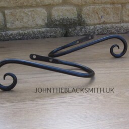 A Pair Of Hand Forged Wrought Iron Scrolled Curtain Holdbacks Blacksmith Made, Satin Black Finish - thumbnail 2