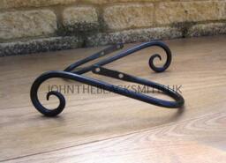 A Pair Of Hand Forged Wrought Iron Scrolled Curtain Holdbacks Blacksmith Made, Satin Black Finish