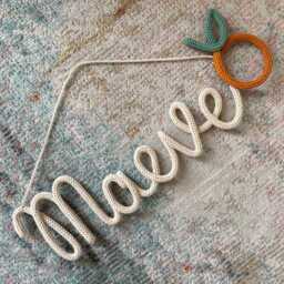 Knitted Name Sign With Clementine Personalised Crochet Orange Wire Wall Art
