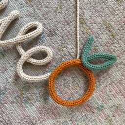 Knitted Name Sign With Clementine Personalised Crochet Orange Wire Wall Art - thumbnail 2