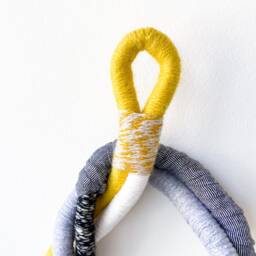 Knot Wrapped Macrame Wall Hanging, Decorative Rope Knot in Yellow & Grey, Large Fiber Art For Interior Decor - thumbnail 2