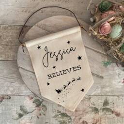 Personalised Christmas Flag, Wall Hanging, Santa Stop Here Sign, We Believe This House Believes Eve Box Gift - thumbnail 3