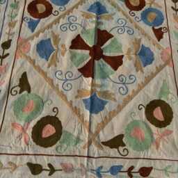 Vibrant Hand-Embroidered Suzani Quilt - Cotton Folk Textile, Boho Chic Throw Blanket, Decorative Bedding - thumbnail 3