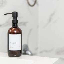 Amber Plastic Refillable Dispenser Bottles Minimalist Shampoo, Conditioner, Soap With Metal Pump - thumbnail 2