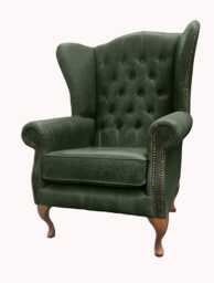 Chesterfield High Back Wing Chair - Presented in Genuine Vintage Green Leather The Kensington