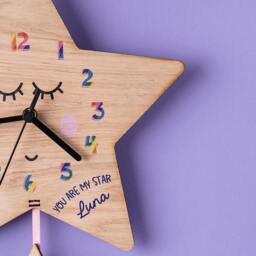 Sleeping Star Children's Personalised Oak Wood Clock With Rainbow Numbers - thumbnail 3
