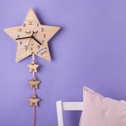Sleeping Star Children's Personalised Oak Wood Clock With Rainbow Numbers - thumbnail 4