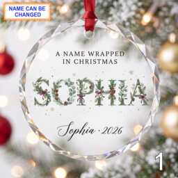 Christmas Glass Ornament, Custom Holiday Name Keepsake With Greenery Lettering, Red Bow & Pine Branches, Personalized Winter Gift - thumbnail 1