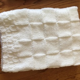 New Born This Is A Hand Knitted Baby Blanket in Pink, Blue Or White. It 25 Inches By Inches. Perfect Size For Stroller - thumbnail 2