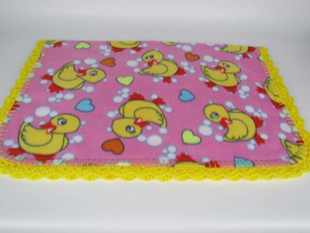 Yellow Rubber Ducks Fleece Baby Blanket in Pink - image 1