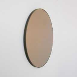 Orbis??? Bronze Tinted Contemporary Round Mirror With A Patina Brass Frame - thumbnail 1