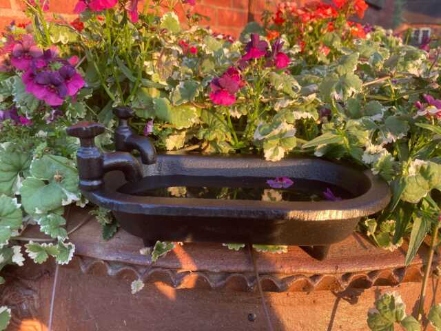 Small Cast Iron Bath Tub Style Birdbath/Feeder - image 1