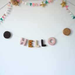 Hand-Painted Clay Hello Garland - Rustic Boho Wall Hanging Sign - thumbnail 1