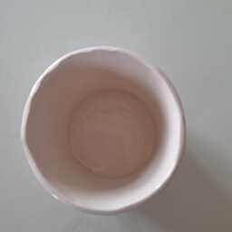 Handmade Ceramic Plant Pot With Cat Watering Flowers - thumbnail 4