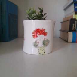 Handmade Ceramic Plant Pot With Cat Watering Flowers - thumbnail 3