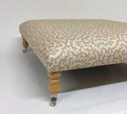 Large Upholstered Footstool in Beige & White Fabric Coffee Table Patterned Large Footstool. Ottoman On Castor Legs - thumbnail 1