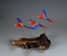 Macaw Parrot Trio Sculpture By John Perry Scarlet 7In Long On Burlwood Base - thumbnail 1