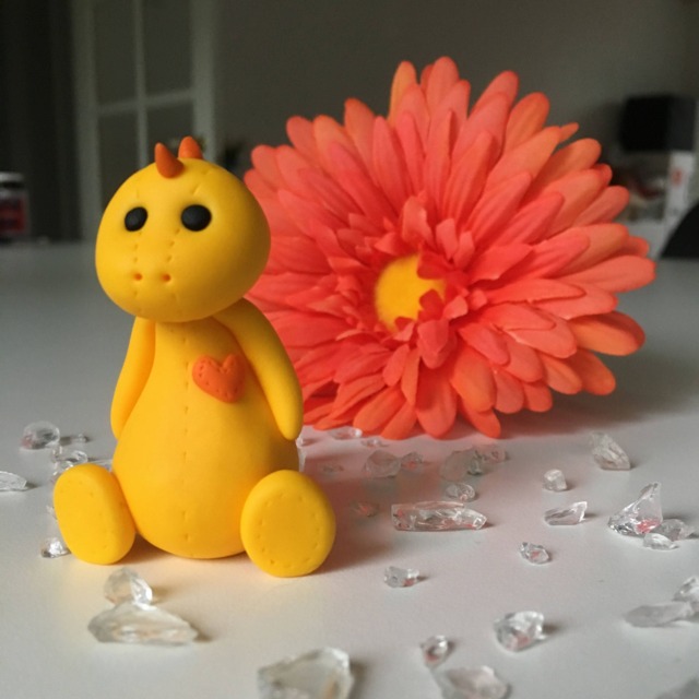 Yellow Dinosaur Plushie With Orange Details - image 1