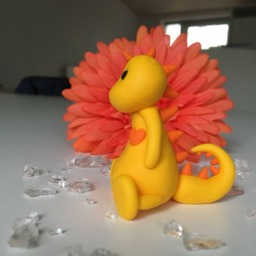 Yellow Dinosaur Plushie With Orange Details - thumbnail 3