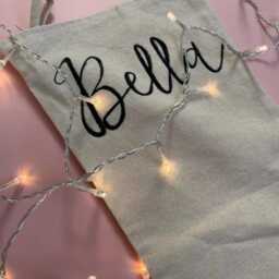 Personalised Linen Christmas Stocking - Hand-Painted Calligraphy Name - thumbnail 2