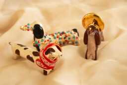 Handcrafted Ceramic Dachshund - Lucky Dog Figurine With Gold Details - thumbnail 1