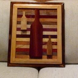 Wood Wall Art Sculpture Featuring 3 Hand Cut Wine Bottle Set in A Variety Of Exotic Hardwood Laminating Strips With Two-Tone Frame - thumbnail 2