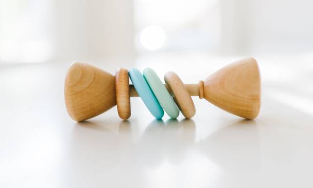 Colorblock Wooden Baby Rattle With Silicone Rings - image 1
