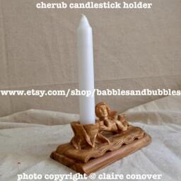 Hand Carved Olive Wood Cherub Candle Holder - thumbnail 1