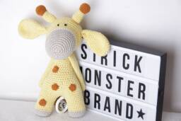 Crocheted Music Box Giraffe - thumbnail 1