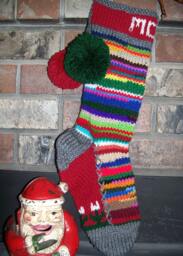 Hand Knit Christmas Stocking Personalized Mom Red Gray Rag Rainbow Stripe Flower Detail By Santa's Works - thumbnail 1