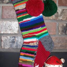 Hand Knit Christmas Stocking Personalized Mom Red Gray Rag Rainbow Stripe Flower Detail By Santa's Works - thumbnail 2