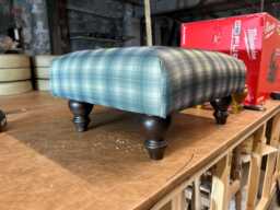 Tartan Style/Check Footstool With Wooden Legs