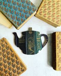 Vintage Book Spine Wall Hanging - Handmade With Vintage Book Dust Jacket Spines Silhouette, Mermaid, Custom States, Teapot Shapes - thumbnail 1