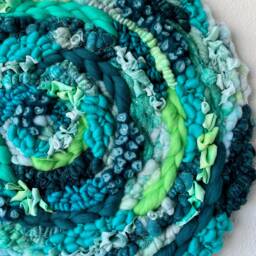 Green Goddess 19-Inch Round Woven Wall Hanging - thumbnail 2